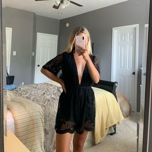 Black plunge neck mesh romper